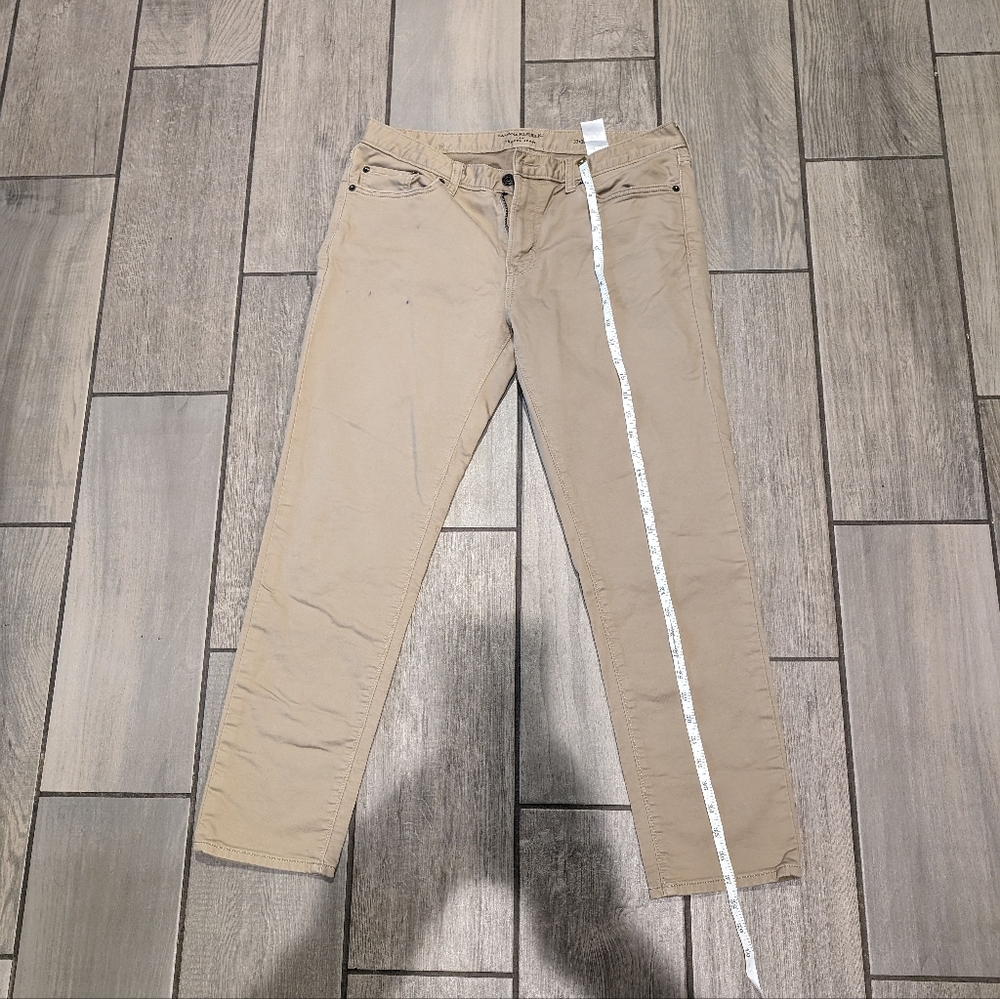 Banana Republic khaki colored:  The traveler Jean.